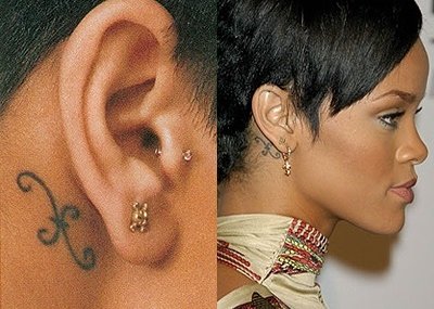 Különleges és bámulatos tetoválásokat gyűjt testén Rihanna