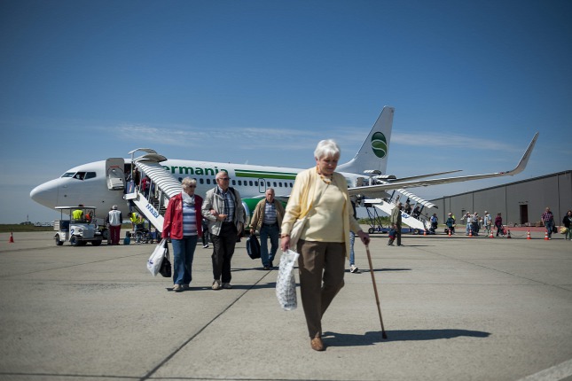 Utasok a Debreceni Nemzetközi Repülőtéren Forrás: MTI/Czeglédi Zsolt