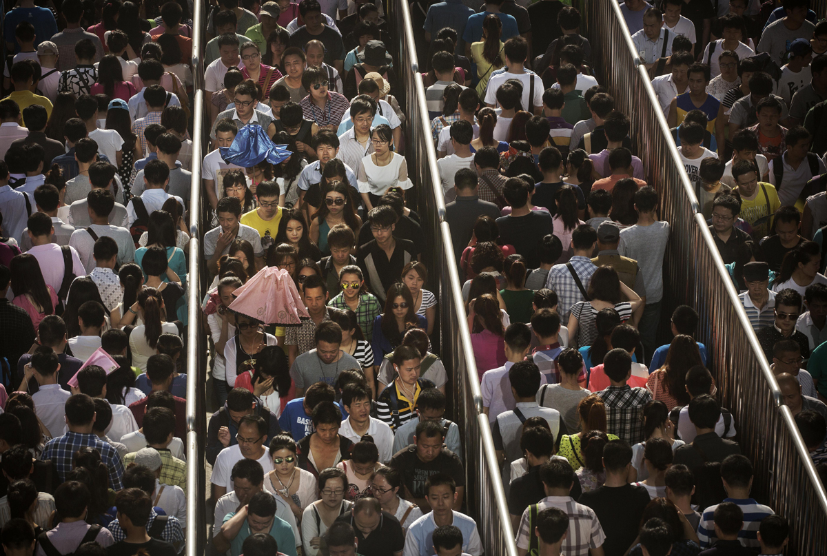 Peking: így metróznak és állnak sorban a óriásváros lakói