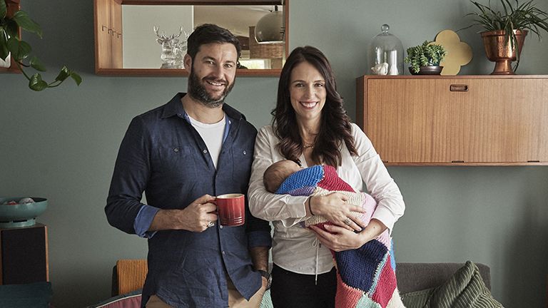 AUCKLAND, NEW ZEALAND - AUGUST 2: In this handout photo provided by the Office of the Prime Minister of New Zealand, Prime Minister Jacinda Ardern and partner Clarke Gayford pose with their baby daughter Neve Gayford at their home on August 2, 2018 in Auckland, New Zealand. (Photo by Derek Henderson/Office of the Prime Minister of New Zealand via Getty Images)