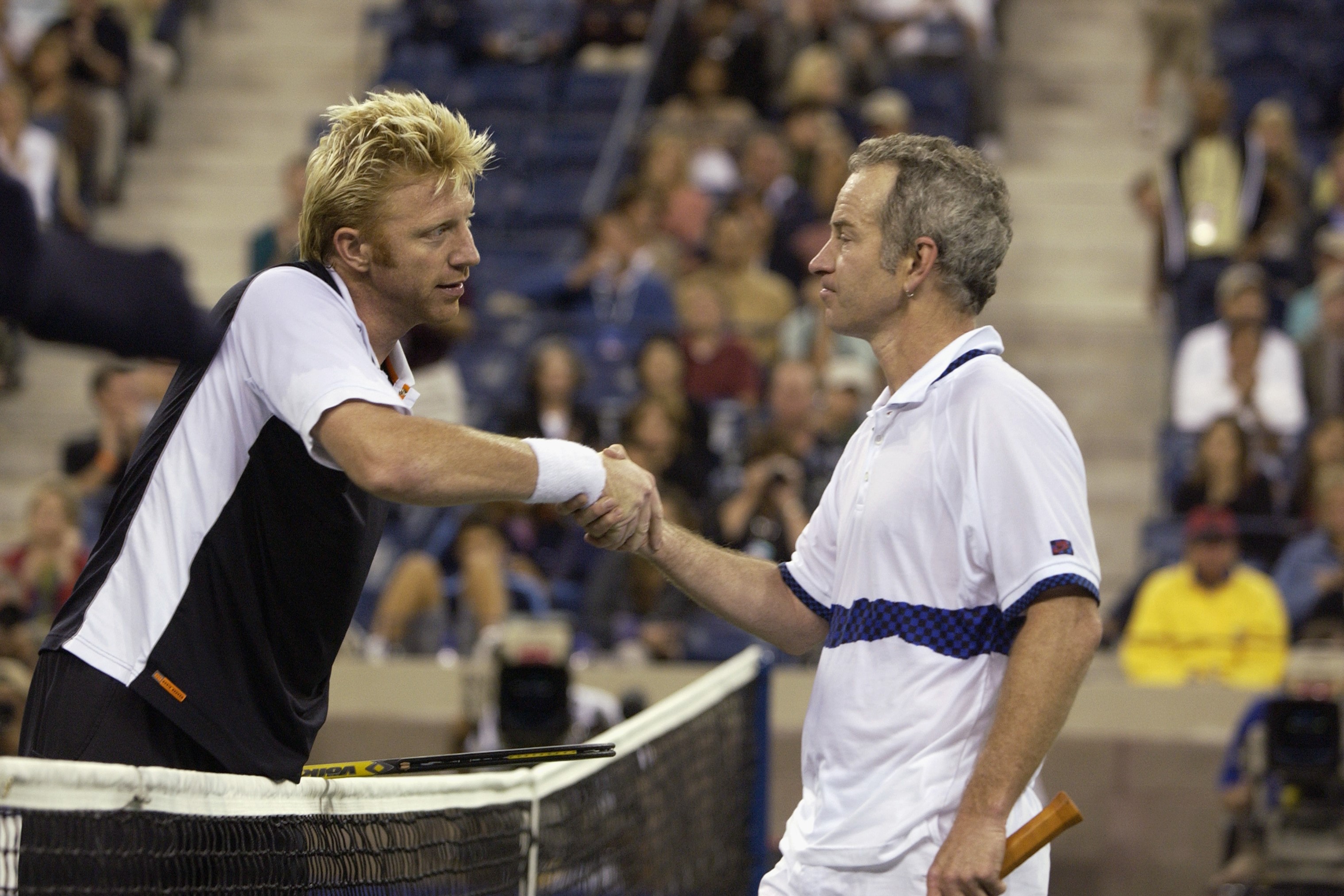 Boris Becker és John McEnroe a US Open egyik meccsén 2002-ben.