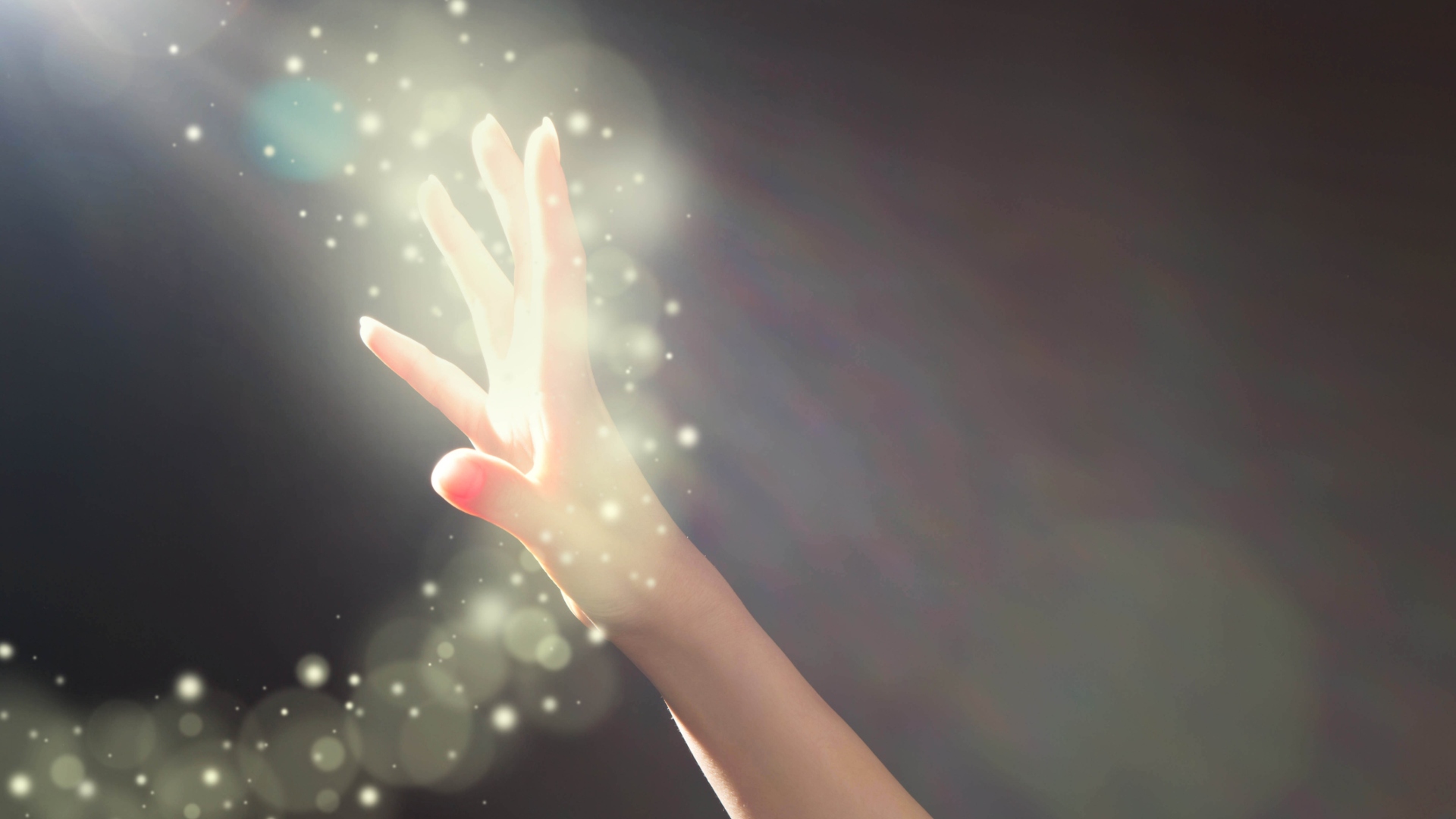 Csillagporba nyúló női kéz
