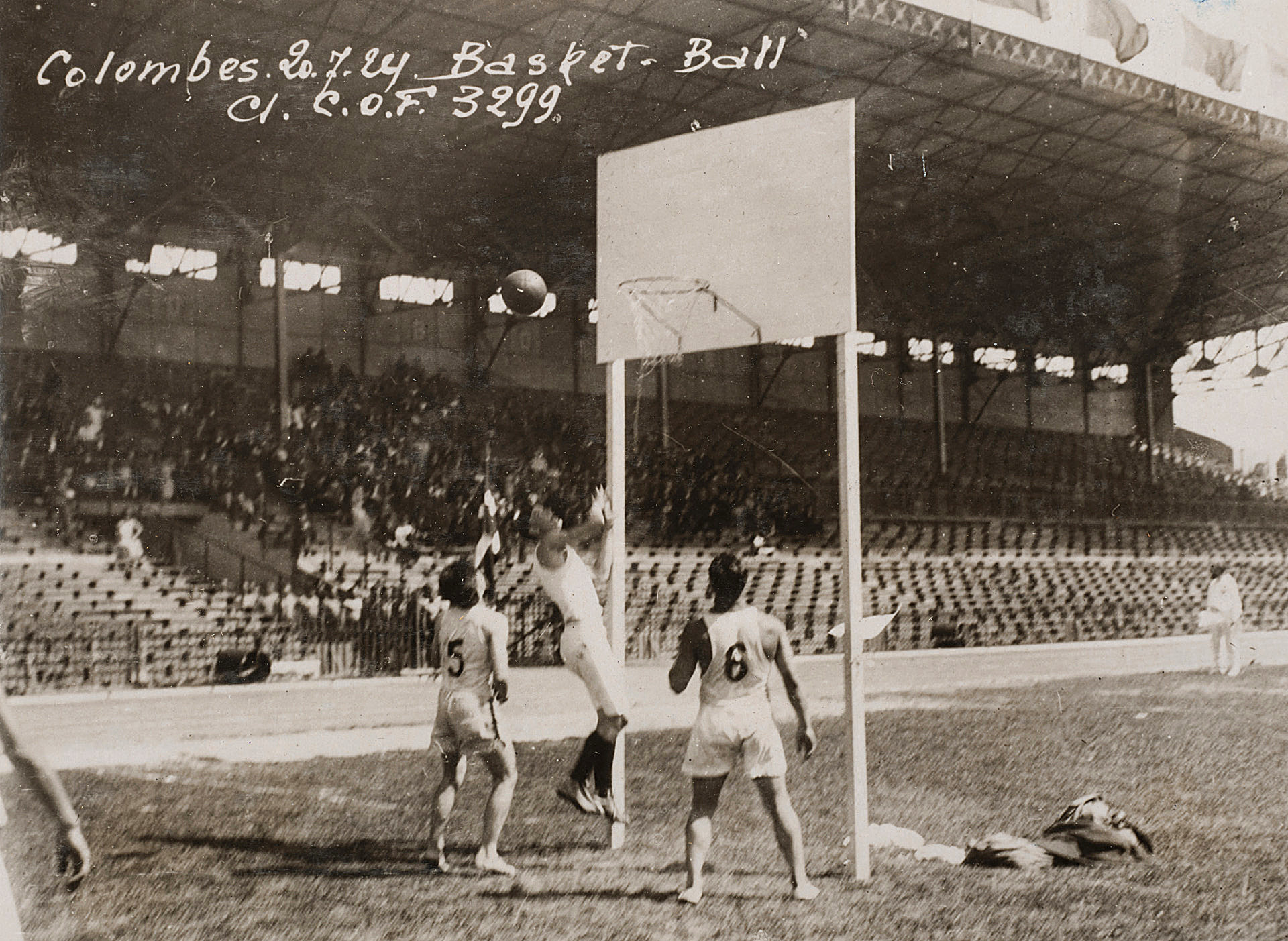 Paris 1924 Olympic Games (Olympic Stadium, Colombes, 20 July 1924): Athletes perform a basketball demonstration during childhood matches at the Colombes Olympic stadium. (Photo by Archives CNOSF / Archives CNOSF / CNOSF via AFP)
